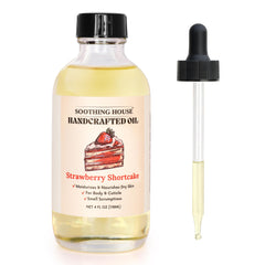 Soothing House Strawberry Shortcake Body Oil bottle shows rich hydration for soft, glowing skin