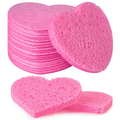 Spunspon heart-shaped pink facial sponge for gentle cleansing and makeup removal.