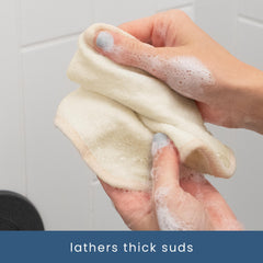 S&T INC exfoliating washcloth cream color close-up shows soft texture.