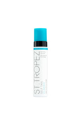 St. Tropez Classic Bronzing Mousse bottle shows natural color development for a seamless tan.