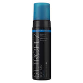 St.Tropez Self Tan Dark Bronzing Mousse application for an even natural glow.