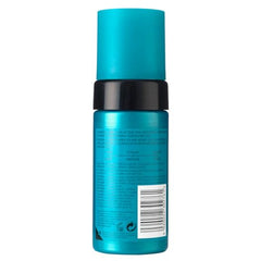 St. Tropez Self Tan Express Mousse and application mitt demonstrate streak-free results.