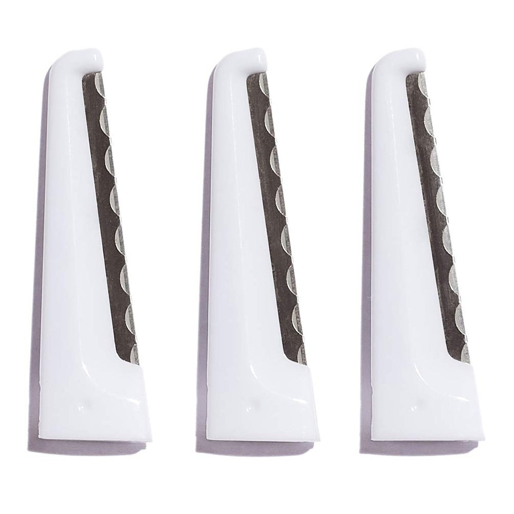 StackedSkincare Dermaplaning replacement blades with protective cap for safe storage.