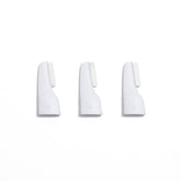 StackedSkincare mini precision dermaplaning blade focused on the nose for targeted exfoliation.