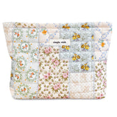 STARDW cotton quilted makeup bag with floral pattern keeps cosmetics organized on the go.