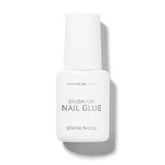 Static Nails brush-on nail glue cap close-up for precise, mess-free control.
