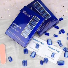Stbisen reusable acrylic press-on nails in ice blue for versatile wear.