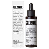 STMNT beard oil bottle being poured for easy daily grooming.