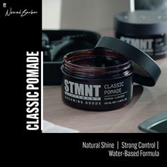 STMNT Grooming Goods Classic Pomade hands warming for smooth, even application.