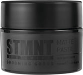 STMNT Matte Paste jar close-up showing matte finish and texture.