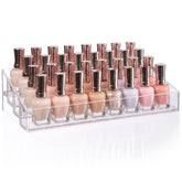 STORi four-tier nail polish display keeps bottles organized for quick selection.