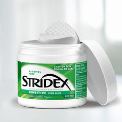 Stridex Sensitive Pads face-application scene showing easy wipe-on use