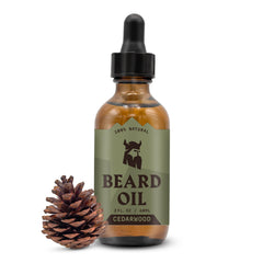 Striking Viking Cedarwood beard oil bottle promotes hydration for soft facial hair.