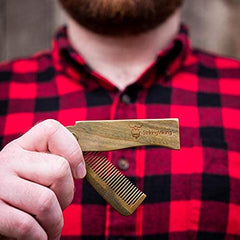 Striking Viking pocket-size wooden comb ready for travel touch-ups