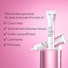 Gently applying StriVectin eye cream to the under-eye area for absorption