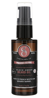 Suavecito Premium Blends beard oil bottle with pump for easy application and skin hydration.