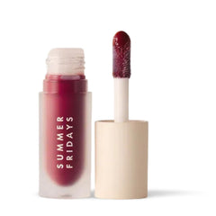 Summer Fridays Dream Lip Oil Midnight Berry bottle showcases hydrating shine.