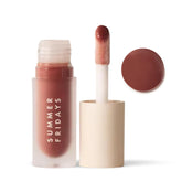 Summer Fridays Dream Lip Oil tube close-up showing glossy, hydrating shine.