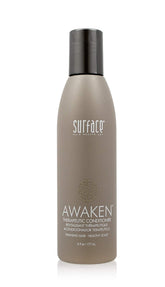 Surface Awaken Therapeutic Conditioner bottle with refreshing scalp feel.
