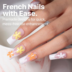 SXC Cosmetics pink French Tip nails on hand show chic, salon-quality look