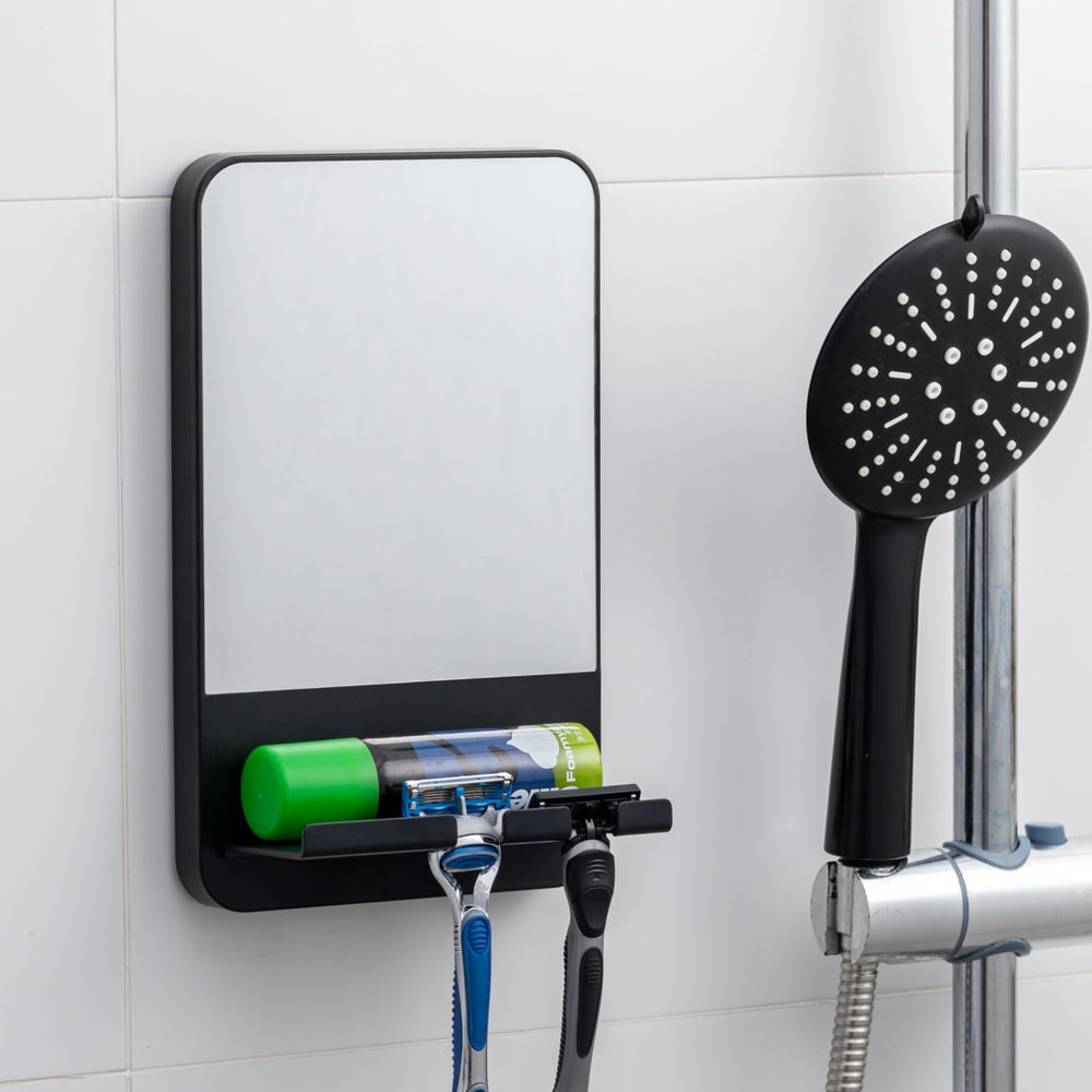 TAILI fogless shower mirror with suction cup for fog-free shaving in the shower.