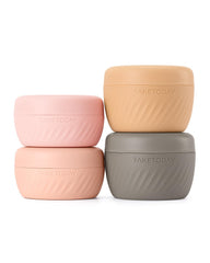 TakeToday apricot 2oz travel containers set for compact, leakproof toiletries.