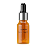 Tan-Luxe The Body Illuminating Drops bottle with a subtle, customizable glow.