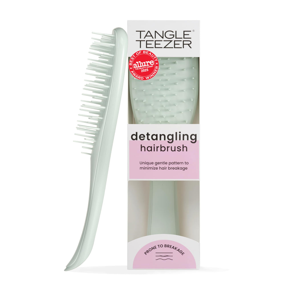 Tangle Teezer Extra Gentle Detangler brush close-up with wide teeth for gentle detangling.