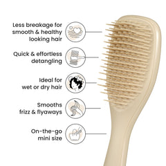 Tangle Teezer Ultimate Detangler being used on dry hair to smooth strands