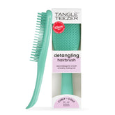 Tangle Teezer Ultimate Detangler shows curved teeth easing curly detangling
