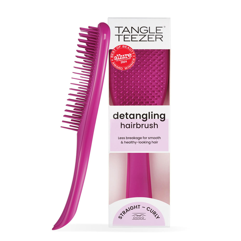 Tangle Teezer Ultimate Detangler on wet hair for gentle detangling.