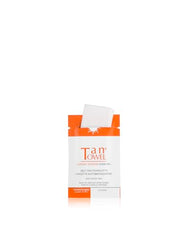 Close-up of TanTowel packaging showing convenient self-tanning towelettes