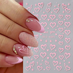Lazo y corazon de TANYOOTO en pegatinas para uñas, estilo romantico.