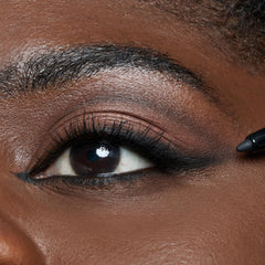 tarte sex kitten liner inner rim application close-up for precise line.