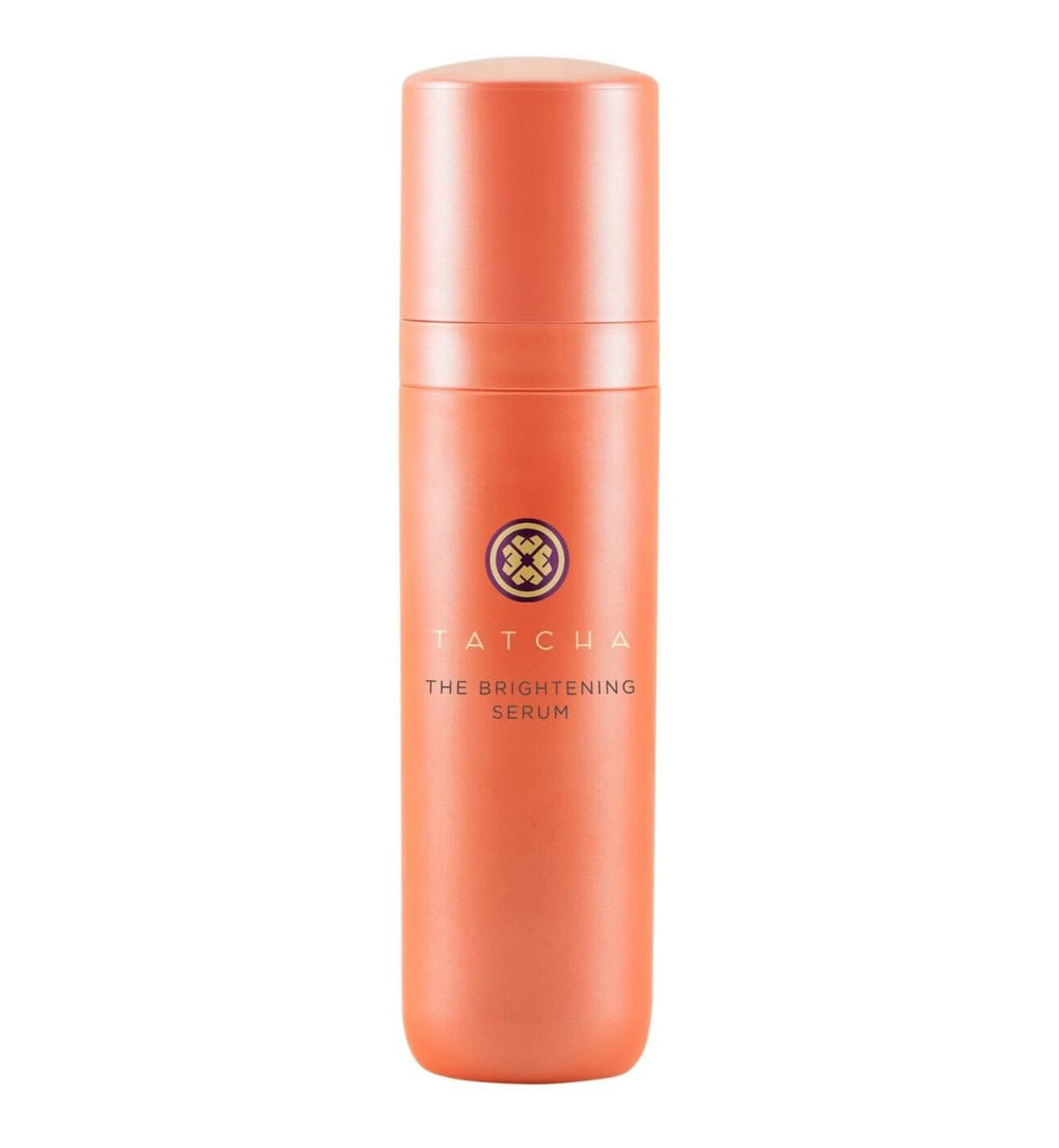 TATCHA Brightening Serum bottle close-up showing glow from vitamin C