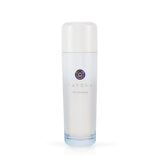 TATCHA The Essence bottle closeup showing a clear serum for smooth, hydrated skin.