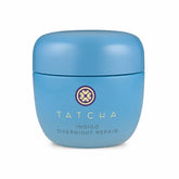 TATCHA Indigo Overnight Repair bottle close; fragrance-free formula for calm, resilient skin.