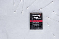 Tattoo Goo Piercing Care: solución a base de agua para limpieza suave y controlada.