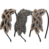 Diadema Tatuo, hoja dorada con cristal azul oscuro, ideal para fiestas de los años 20.