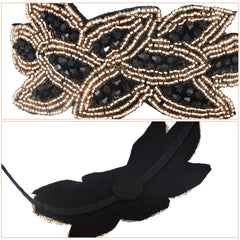 Diadema Tatuo, hoja dorada con cristal negro, ideal para eventos nocturnos.