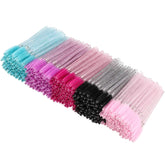 Tbestmax 500 disposable mascara wands in pink for precise lash separation.