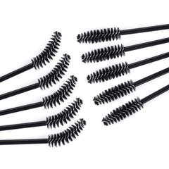 Tbestmax spoolie applicator with black handle for smooth makeup application.