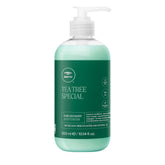 Tea Tree cabello y cuerpo hidratante, botella en uso diario para cabello y piel.