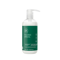 Tea Tree Hair and Scalp Treatment bottle pour for quick scalp hydration.