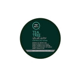 Tea Tree Special Detox Foaming Salt Scrub bottle showing exfoliating salts.