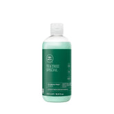 Tea Tree Special Shampoo bottle tingling for a refreshing scalp sensation.