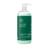 Tea Tree Special Shampoo bottle tingling to refresh scalp and invigorate hair.