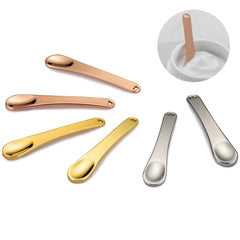 Tekson rose gold spatula set for precise, hygienic application.
