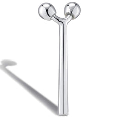 Tekson facial roller with 3D metal design delivering a smooth glide.