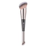 TEOYALL dual-ended brush with large curved head for seamless foundation blending.